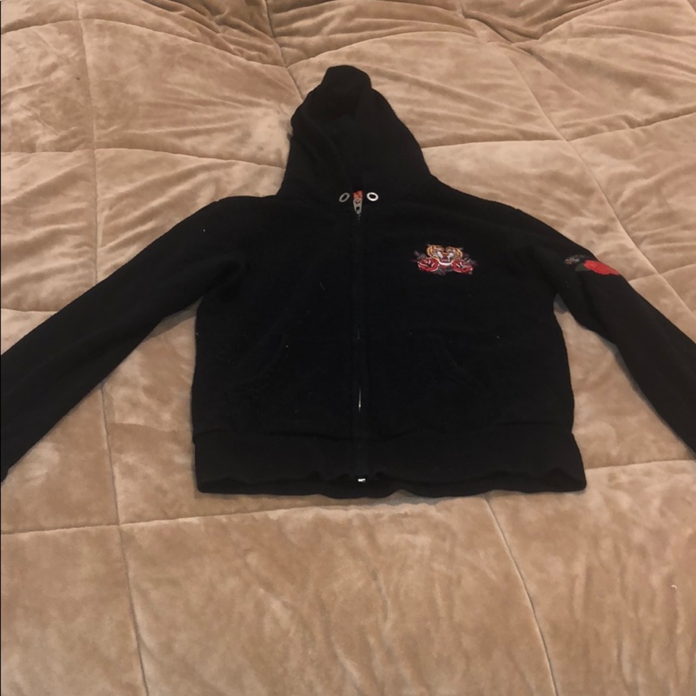 This sweater is small on me.